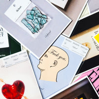 Collection of greeting cards with various designs and text.