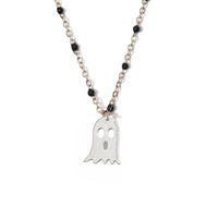 Necklace with a ghost charm on a white background