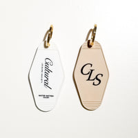 Cultural Leisure Society Keyring • White / Beige
