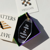 MMG Keyring • Transparent • The visible is the invisible.