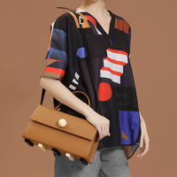 Mokita / V-Neck Blouse • Black
