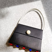 Long Trapezoid Top Handle Satchel Bag • Black