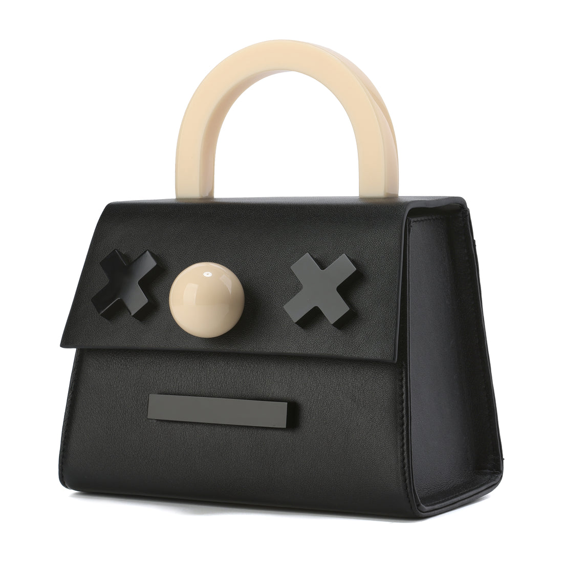 Black handbag with beige handle and decorative elements on a white background