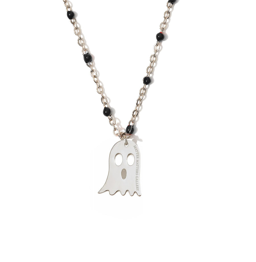 Necklace with a ghost charm on a white background