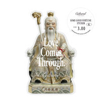 Sticker of a traditional figure with text 'Love Comes Through' and 'Cultural' branding on a white background.