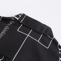 'Not' / Pattern Loose Fit Capri Shirt • Black
