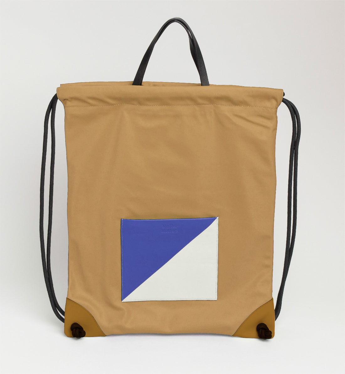 The Square / Drawstring Backpack • Tan